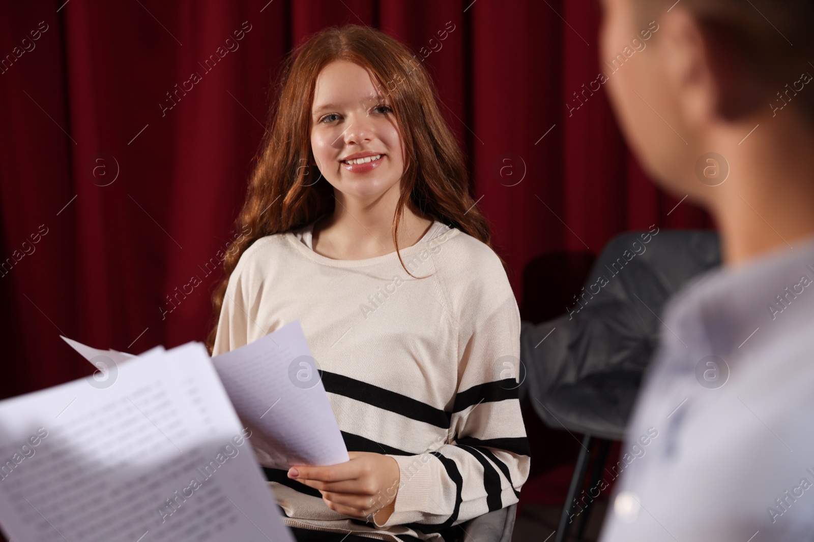 Photo of Professional actors rehearsing on stage in theatre