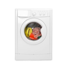 Photo of Washing machine full of colorful clothes isolated on white