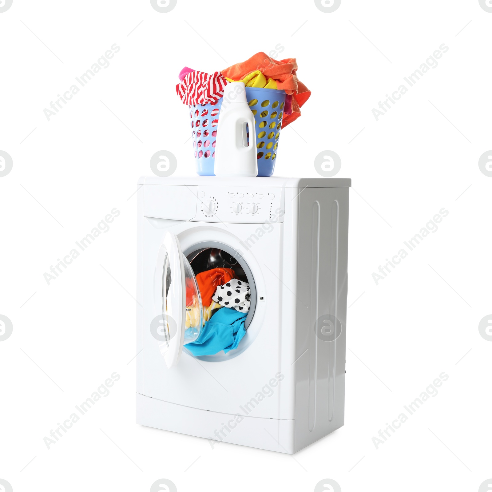 Photo of Washing machine, detergent and laundry basket with colorful clothes isolated on white