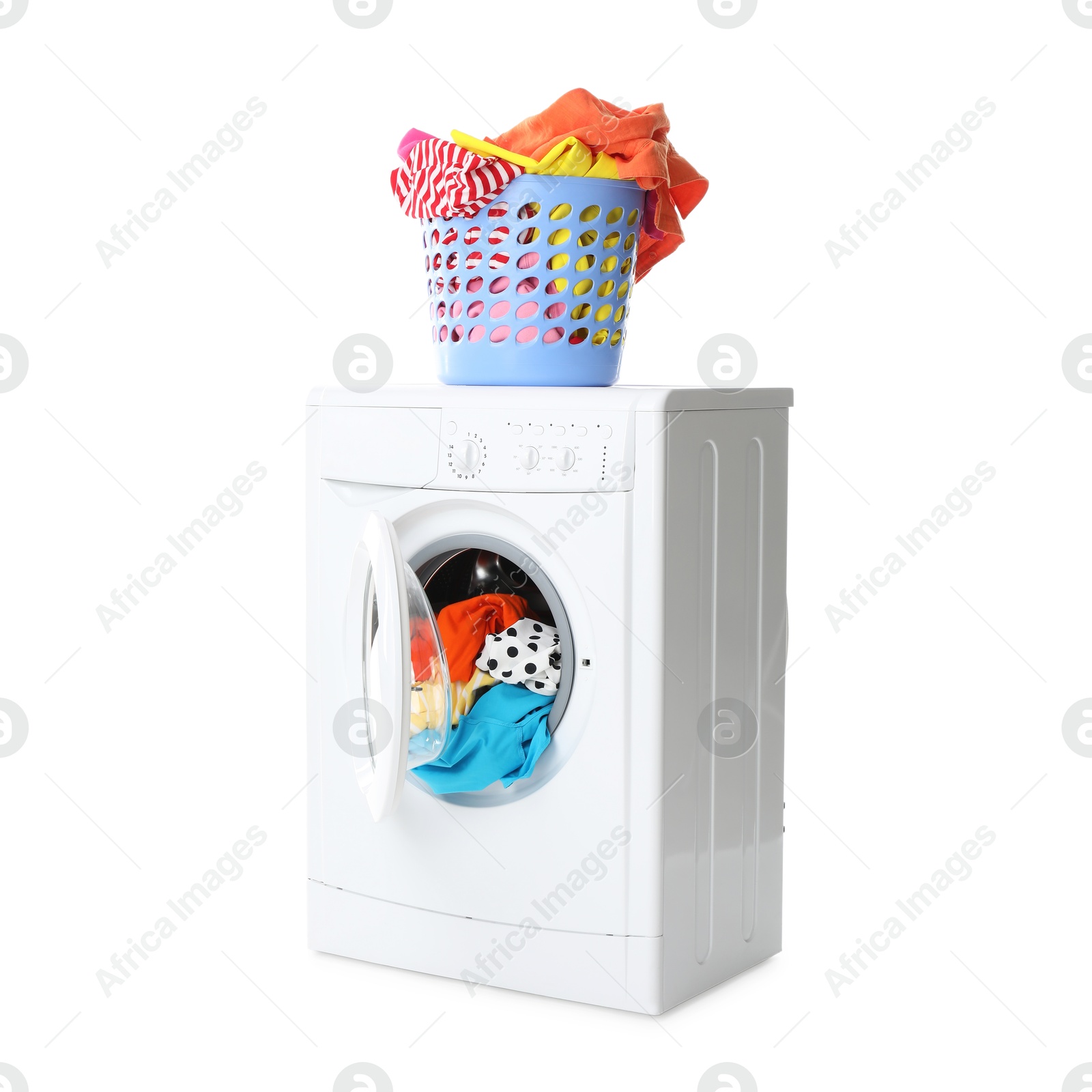 Photo of Washing machine and laundry basket with colorful clothes isolated on white