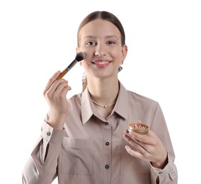 Photo of Smiling teenage girl applying blusher with makeup brush on white background