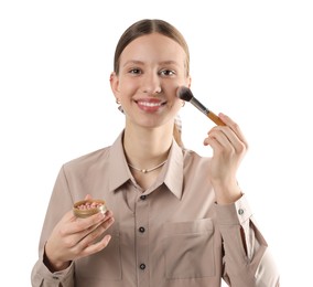 Photo of Smiling teenage girl applying blusher with makeup brush on white background