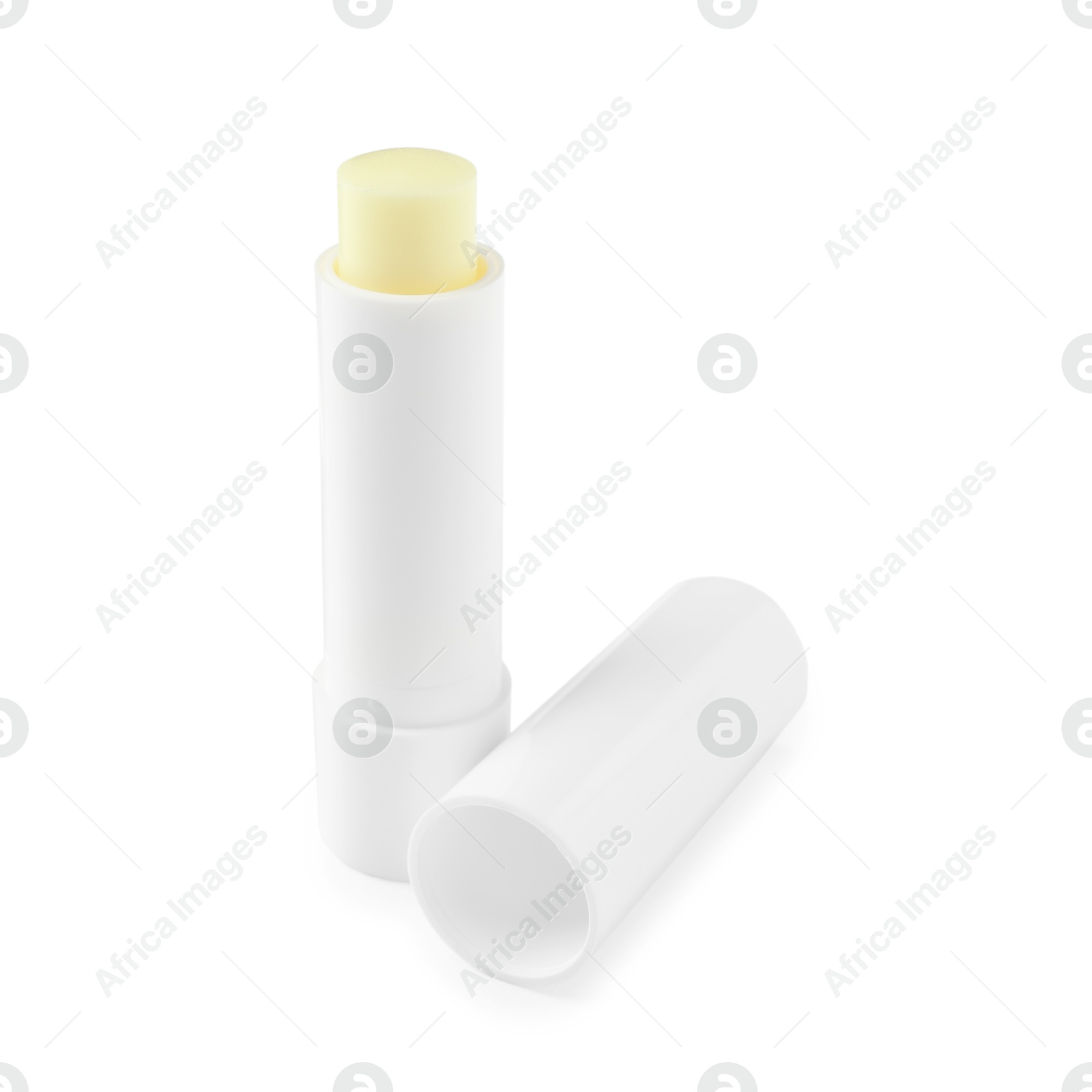 Photo of Lip balm isolated on white. Cosmetic product