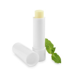 Photo of Mint lip balm and green leaves isolated on white. Cosmetic product