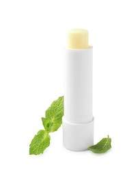 Photo of Mint lip balm and green leaves isolated on white. Cosmetic product