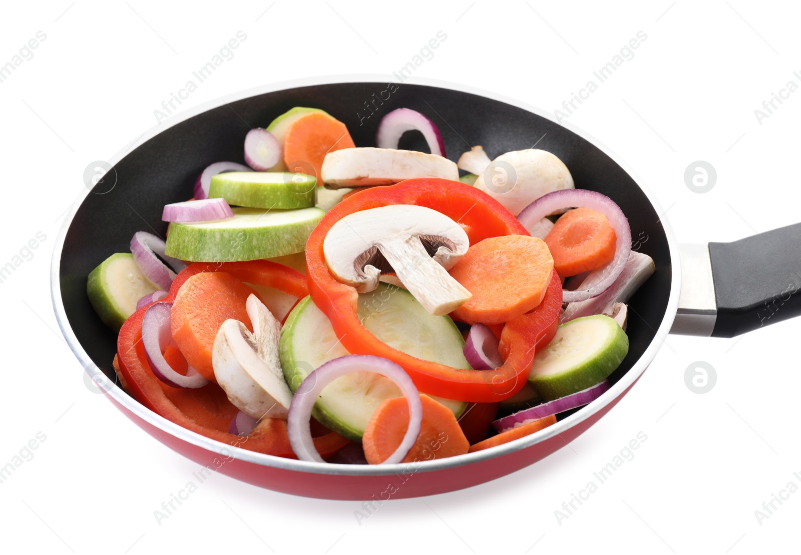 Photo of Frying pan with mix of fresh vegetables and mushrooms isolated on white