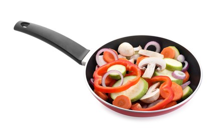 Photo of Frying pan with mix of fresh vegetables and mushrooms isolated on white