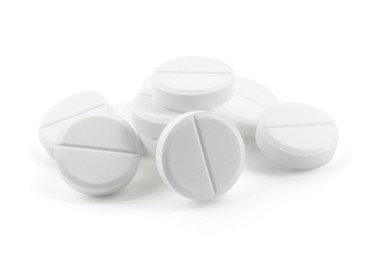 Photo of Antibiotic pills isolated on white. Medicinal treatment