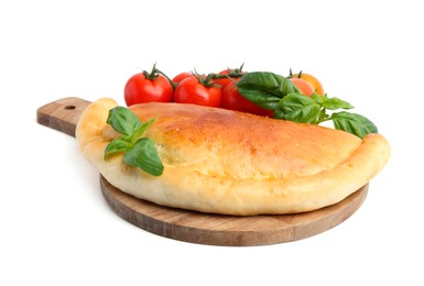 Photo of Tasty vegetarian calzone with basil and tomatoes isolated on white