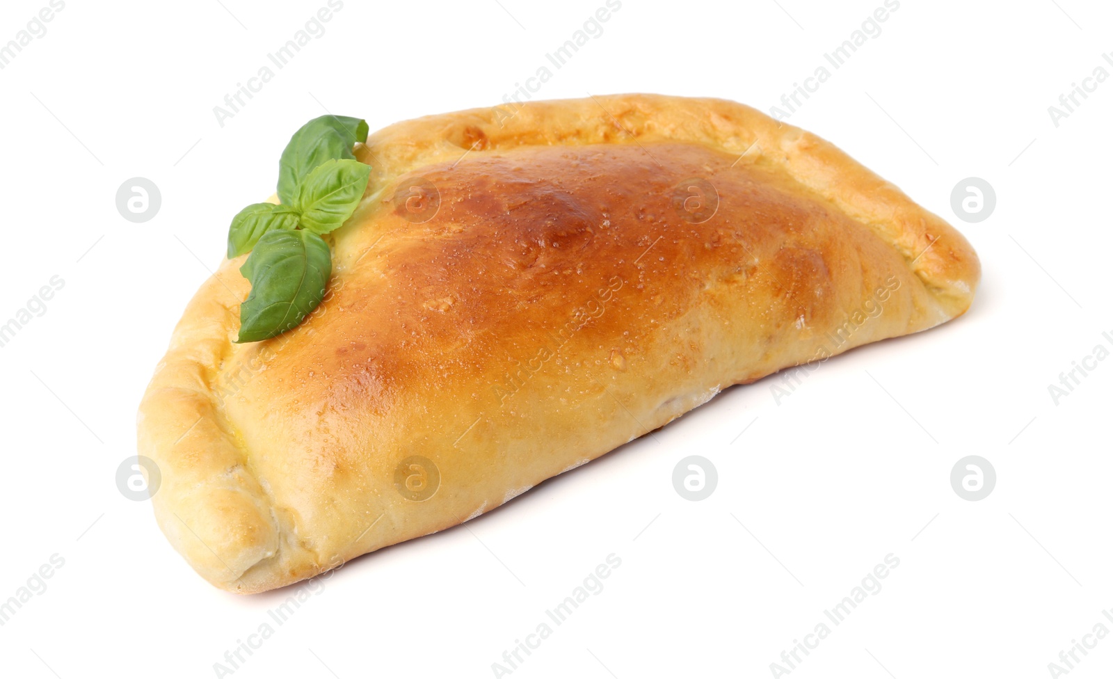 Photo of Tasty vegetarian calzone with basil isolated on white