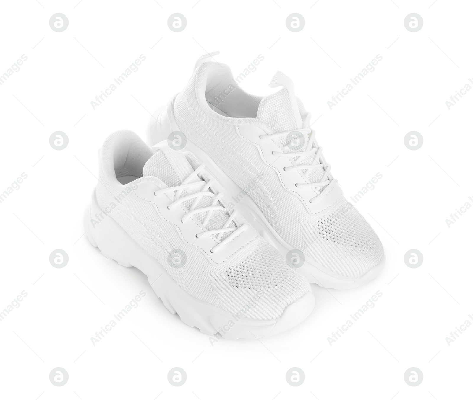 Photo of Pair of stylish sneakers isolated on white