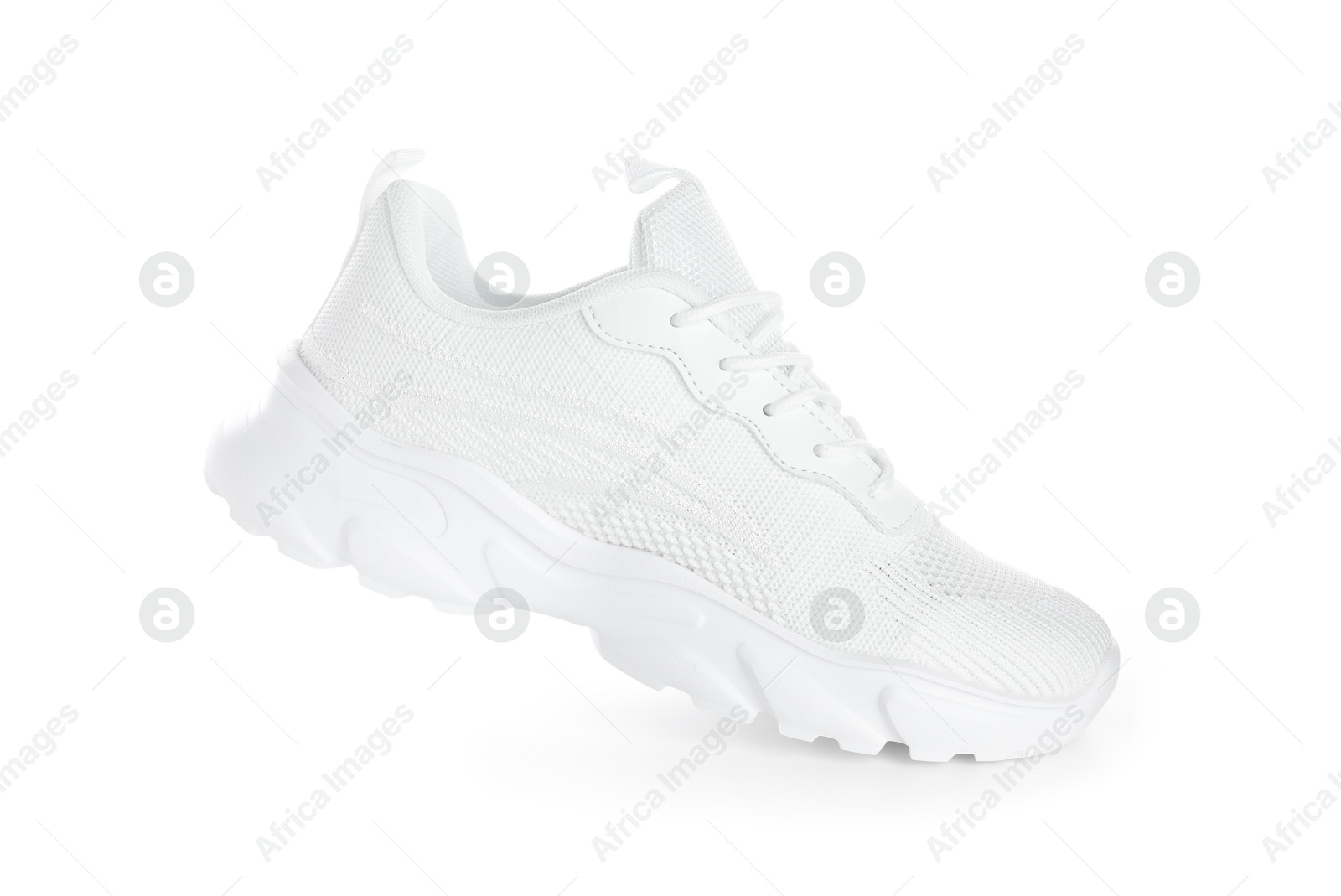 Photo of One stylish sneaker isolated on white. Comfortable footwear