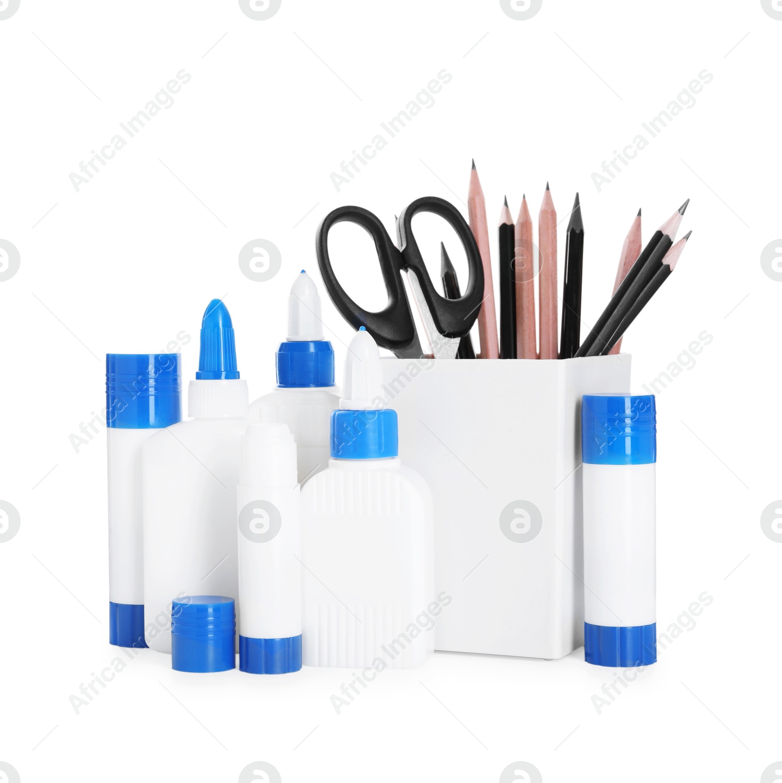 Photo of Different types of glue, scissors and pencils isolated on white