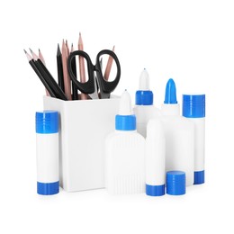 Photo of Different types of glue, scissors and pencils isolated on white