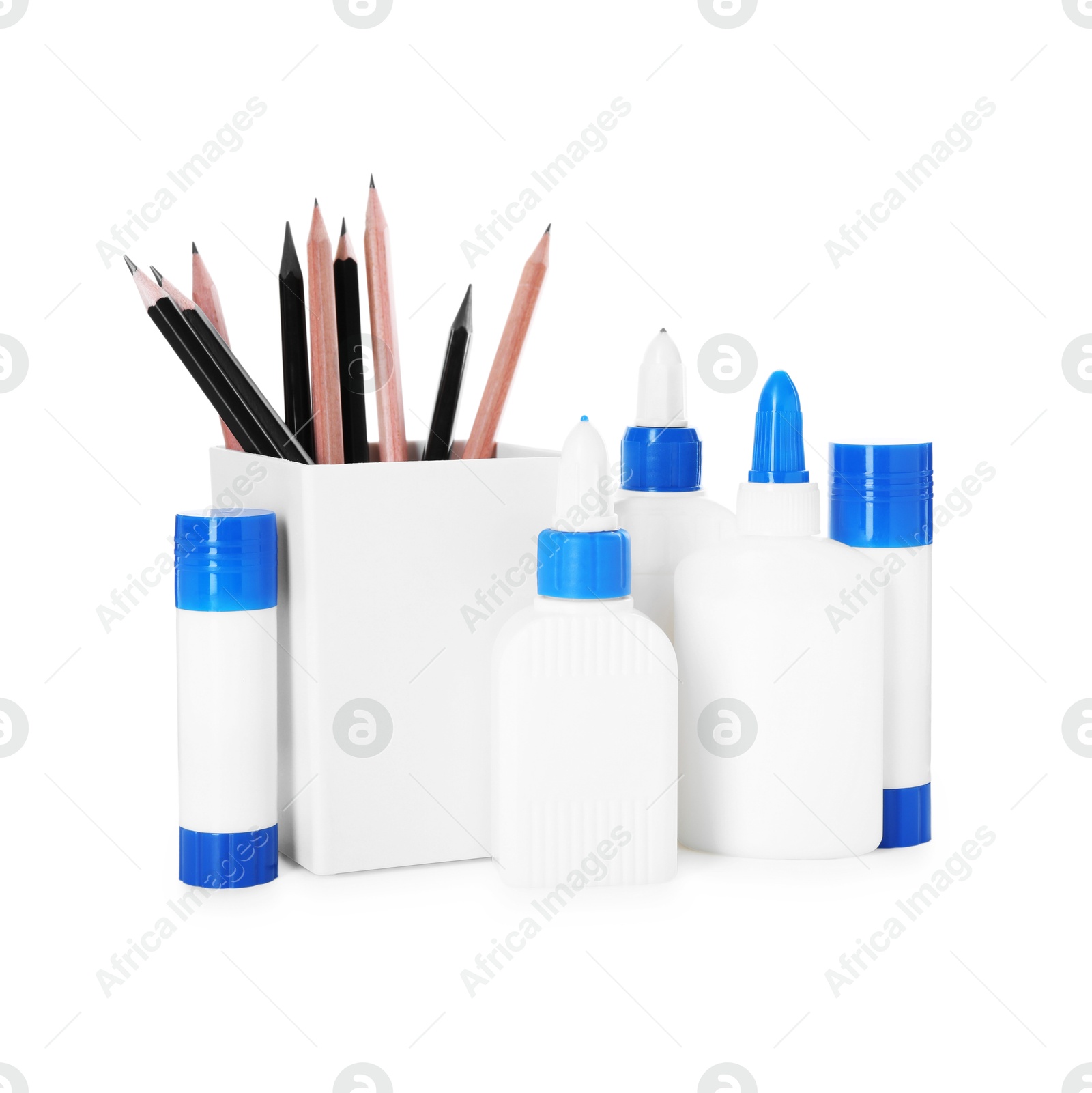 Photo of Different types of glue and pencils isolated on white