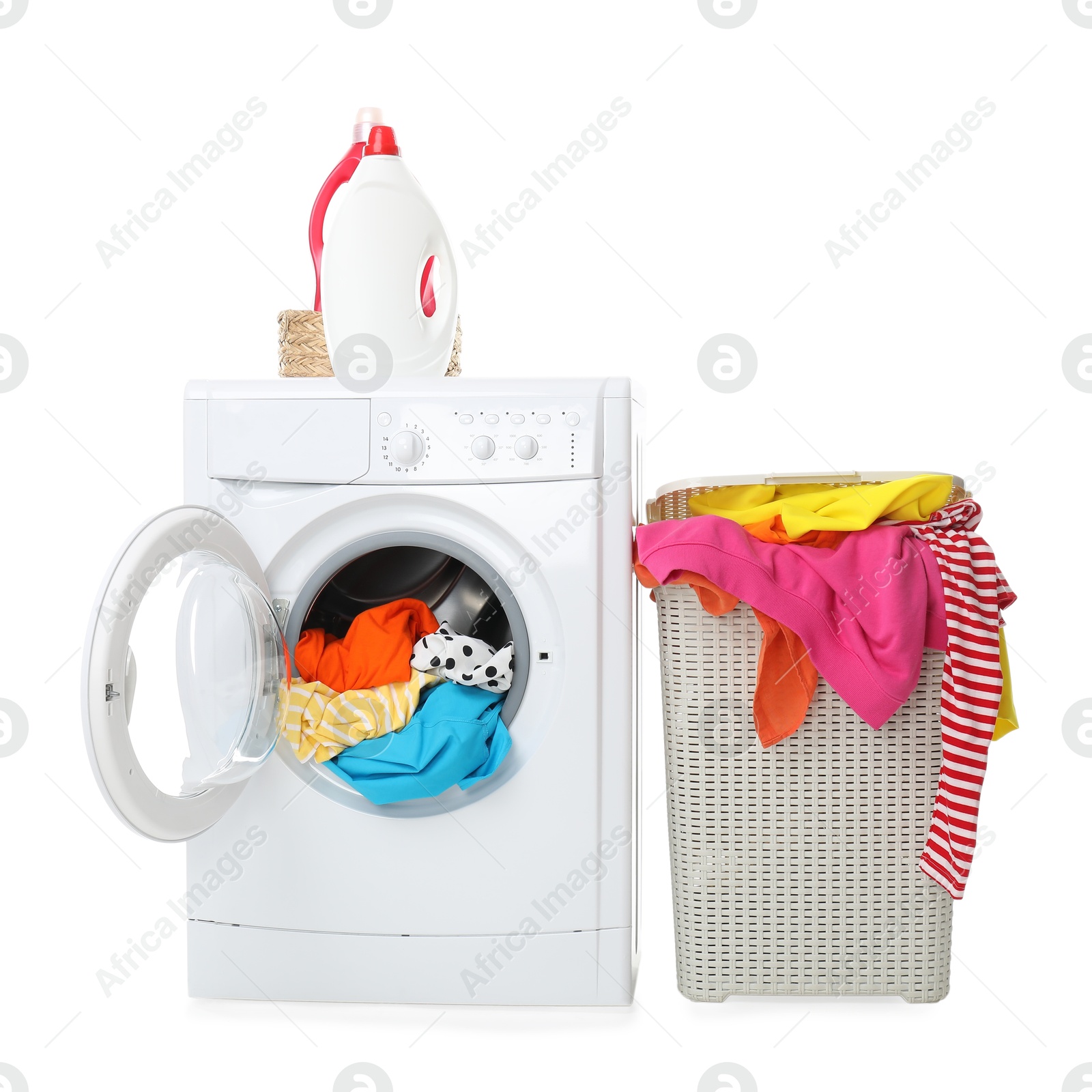 Photo of Washing machine, detergents and laundry basket with colorful clothes isolated on white