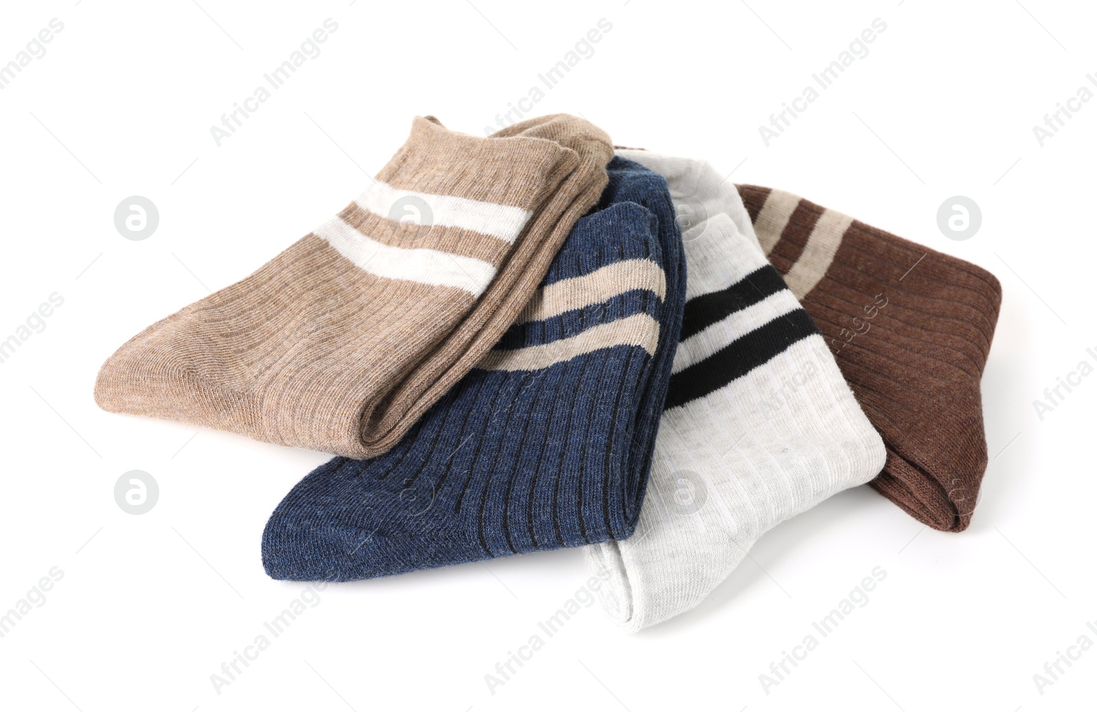 Photo of Pairs of folded soft socks isolated on white