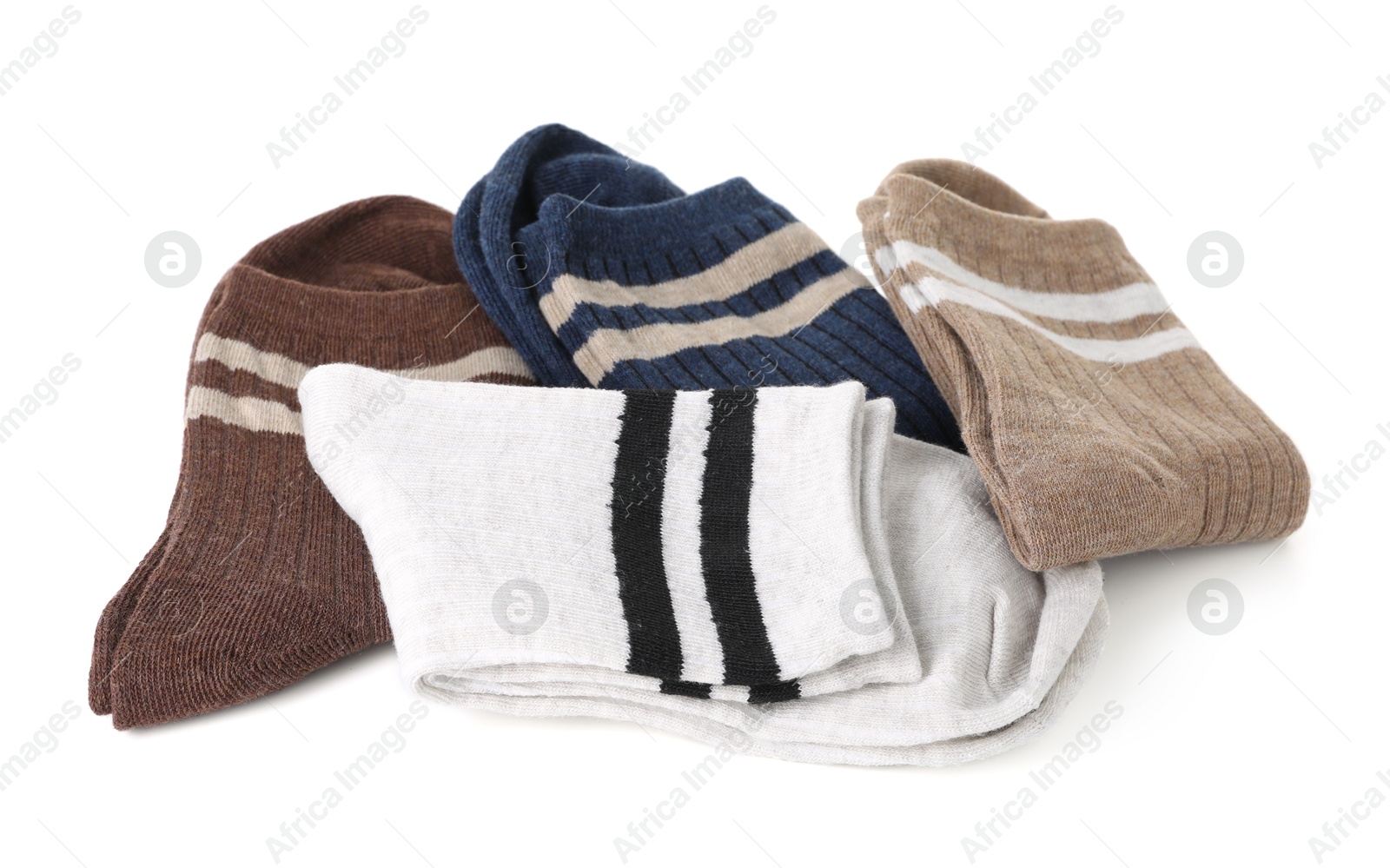 Photo of Pairs of folded soft socks isolated on white