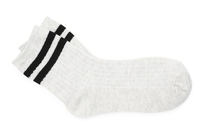 Photo of Pair of soft socks isolated on white, top view