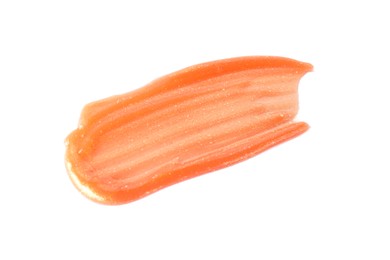 Photo of Sample of orange lipgloss isolated on white, top view