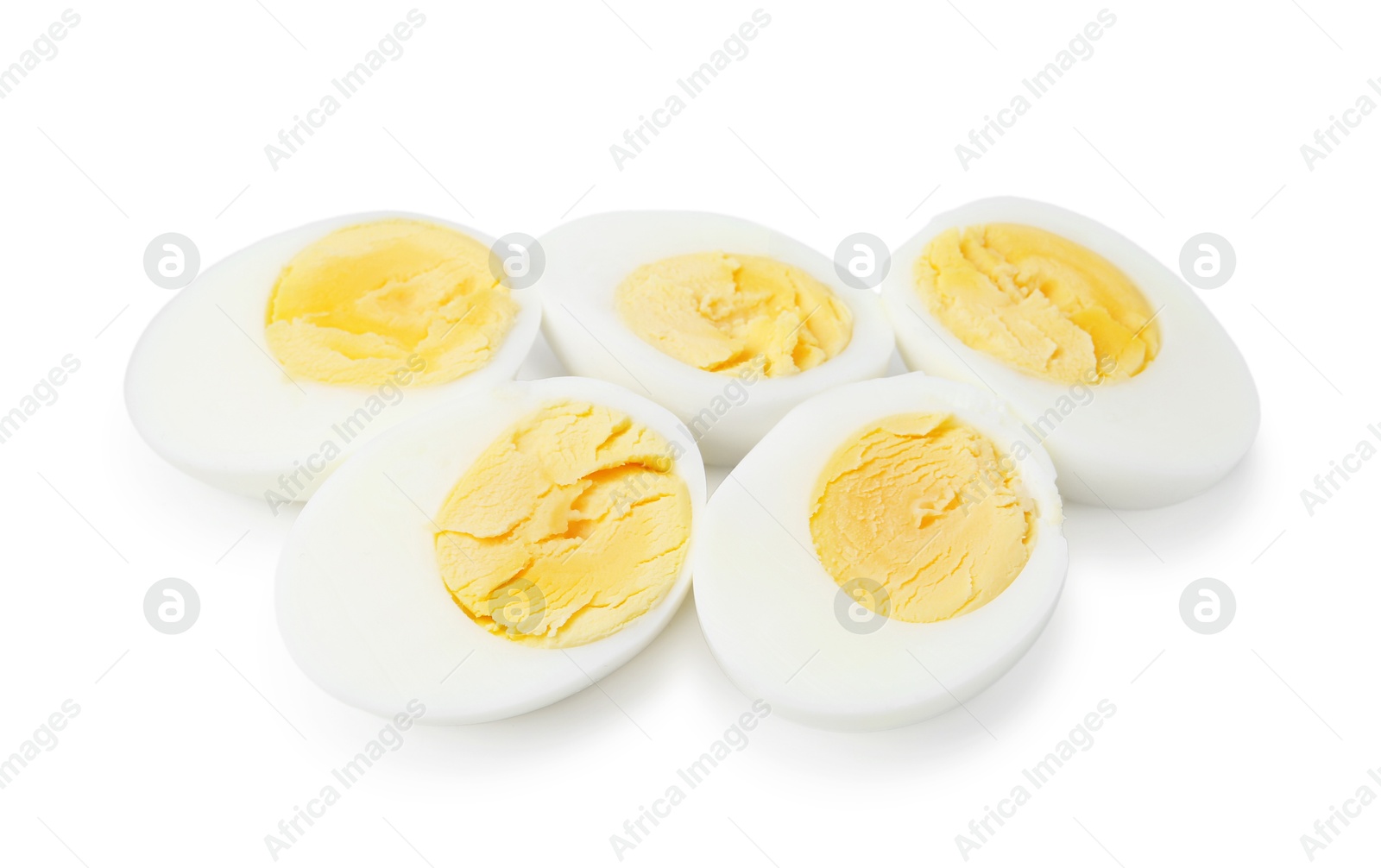 Photo of Halves of hard boiled eggs isolated on white