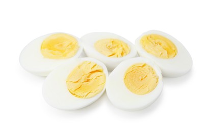 Photo of Halves of hard boiled eggs isolated on white