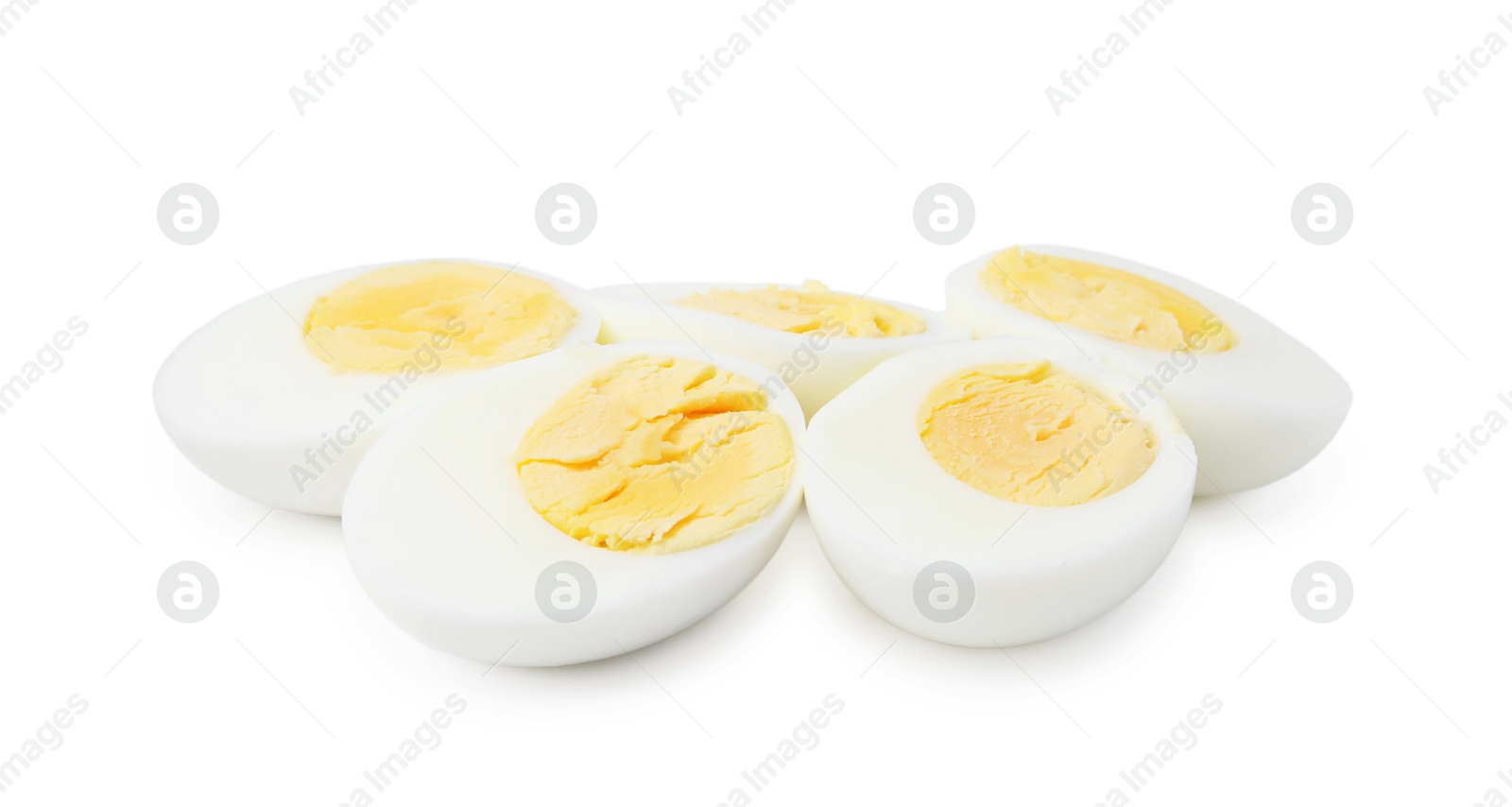 Photo of Halves of hard boiled eggs isolated on white