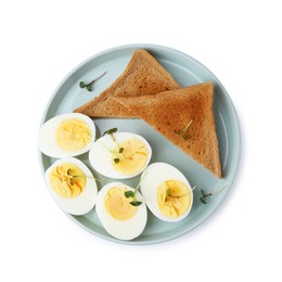 Photo of Halves of hard boiled eggs and bread isolated on white, top view