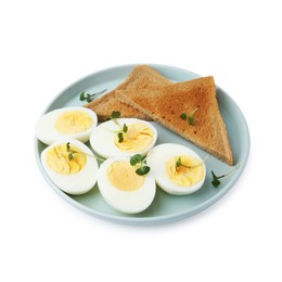 Photo of Halves of hard boiled eggs and bread isolated on white