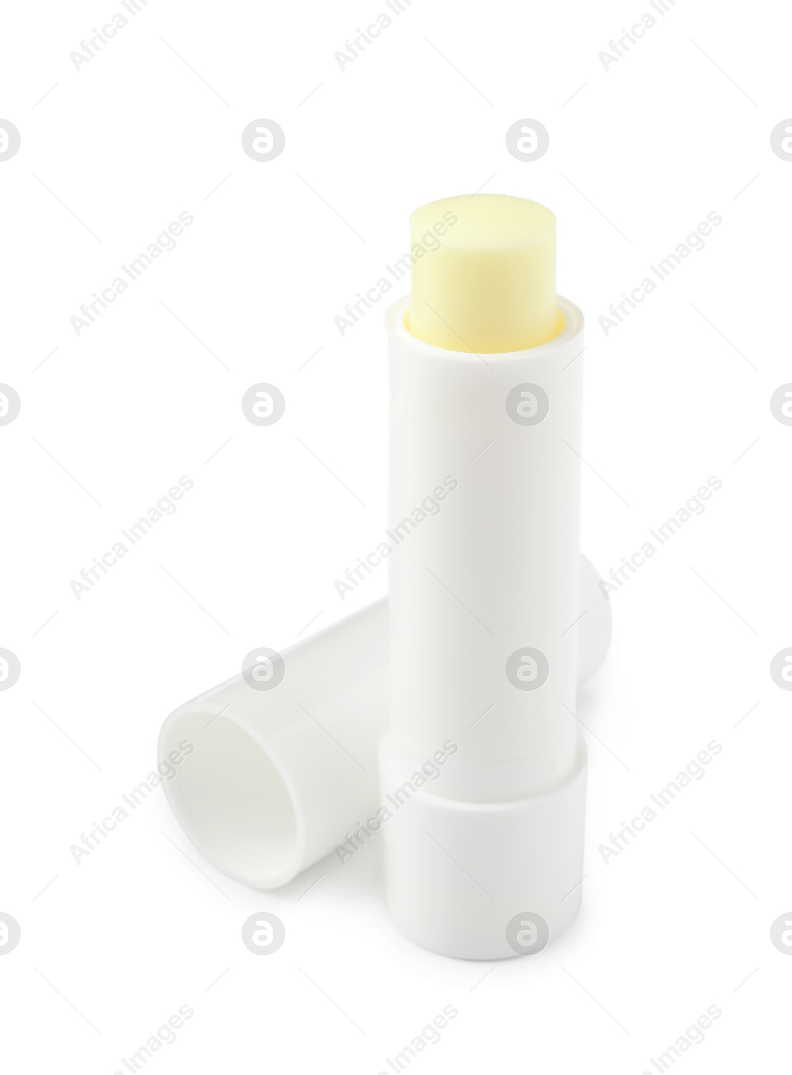 Photo of Lip balm isolated on white. Cosmetic product