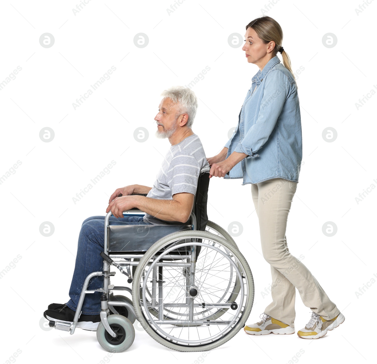 Photo of Woman with senior man in wheelchair on white background