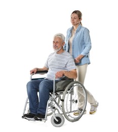 Woman with senior man in wheelchair on white background