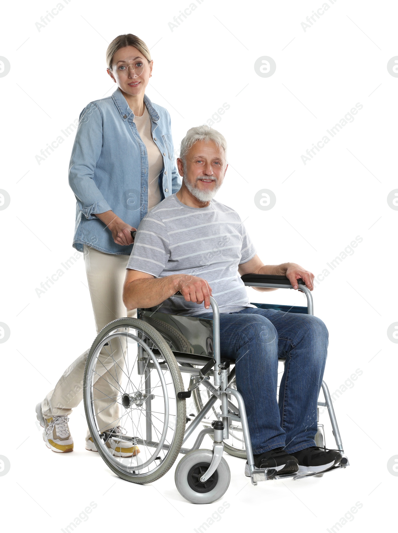 Photo of Woman with senior man in wheelchair on white background