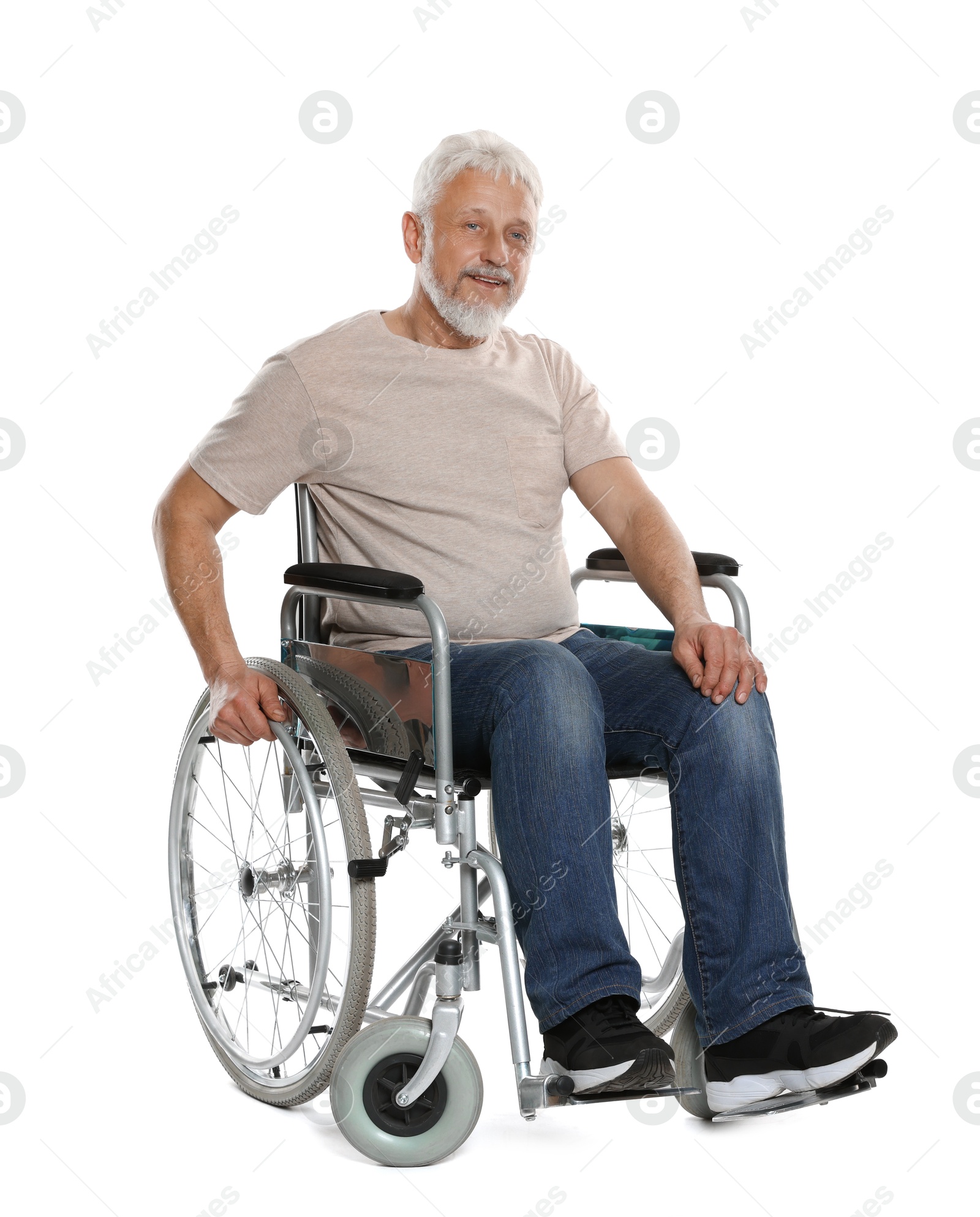 Photo of Senior man in wheelchair on white background