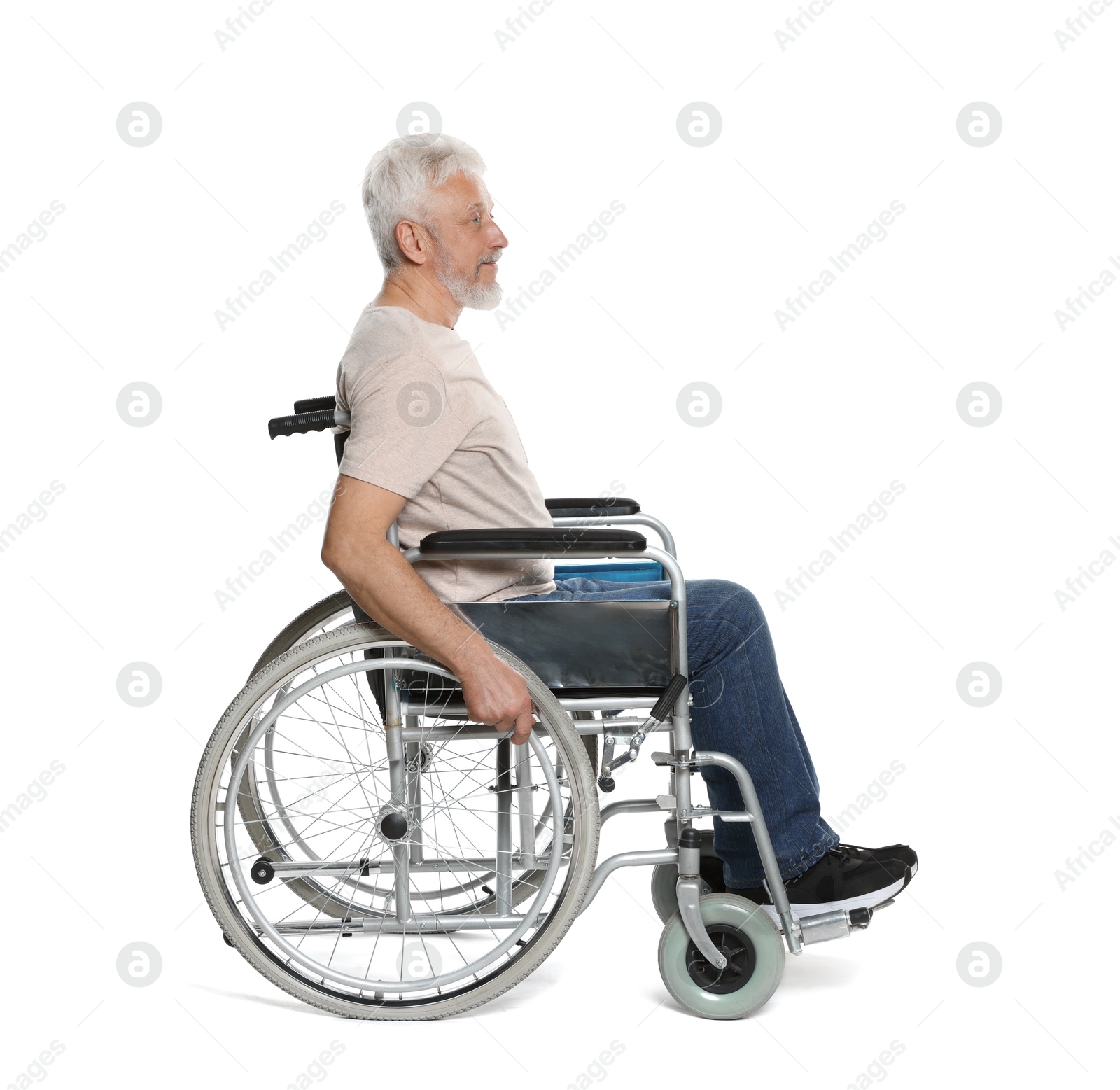 Photo of Senior man in wheelchair on white background