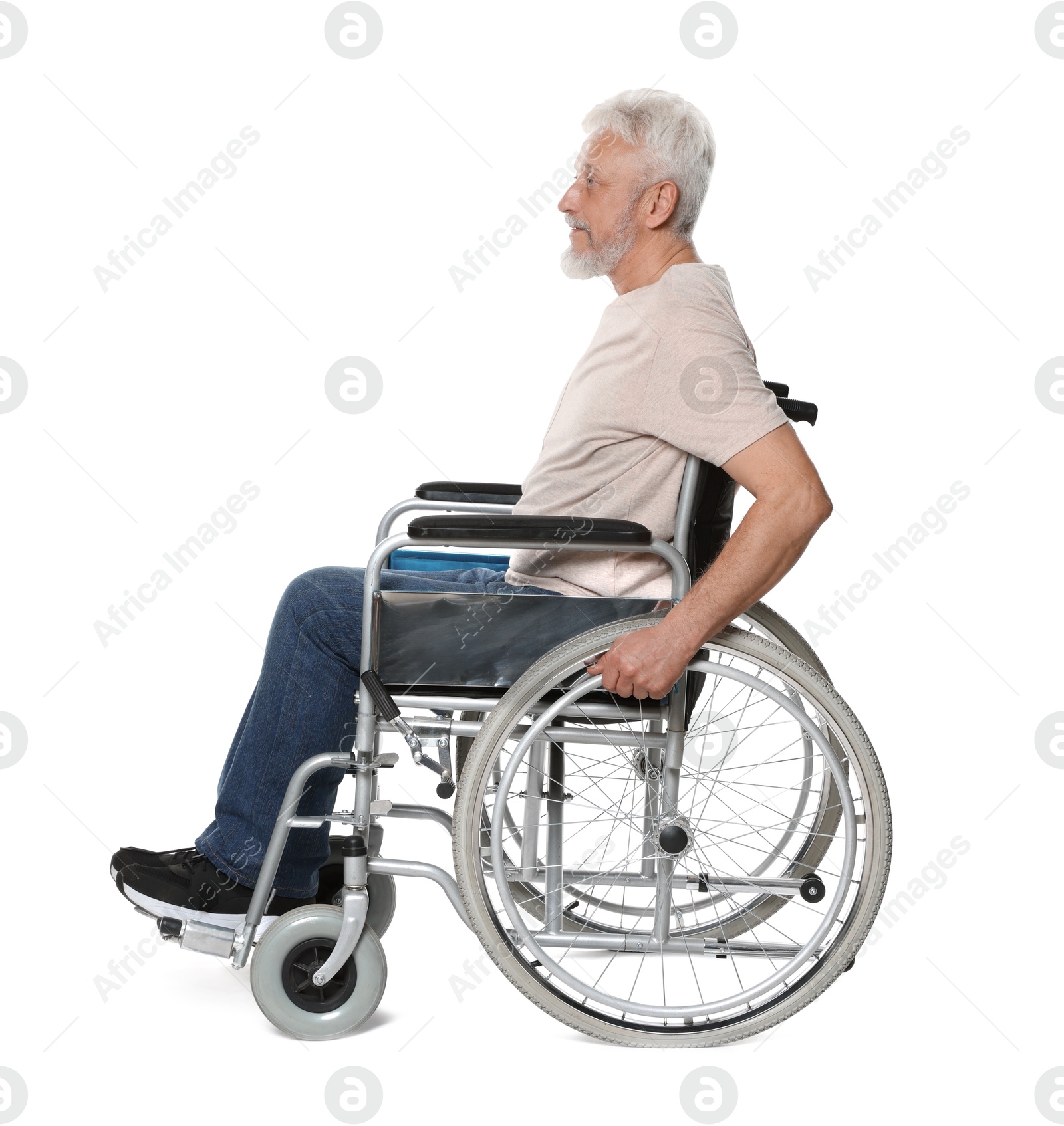 Photo of Senior man in wheelchair on white background