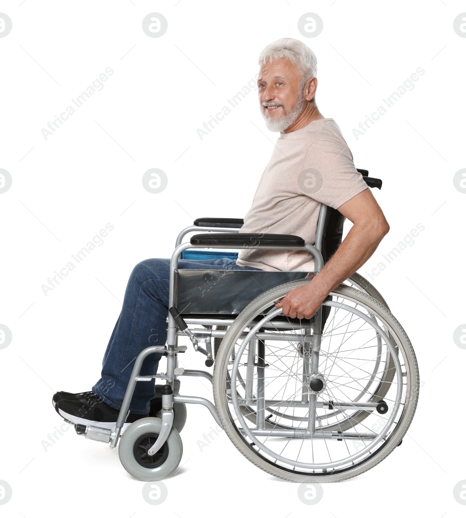 Photo of Senior man in wheelchair on white background