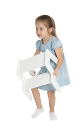 Photo of Little girl with step stool on white background