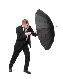 Photo of Man in suit with black umbrella on white background