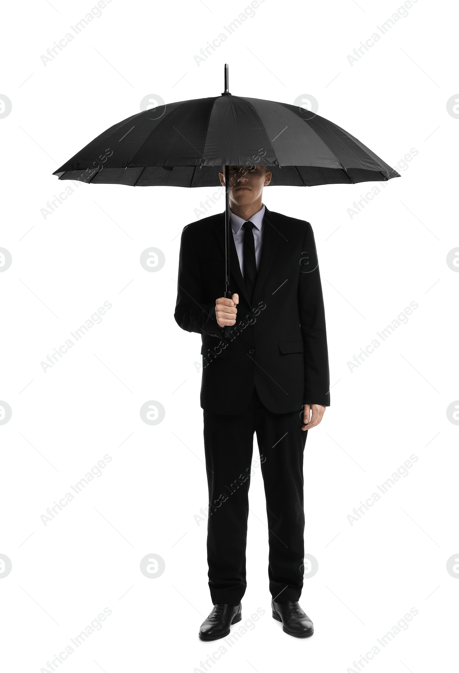 Photo of Man in suit with black umbrella on white background