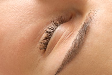 Photo of Closeup view of woman with closed eye