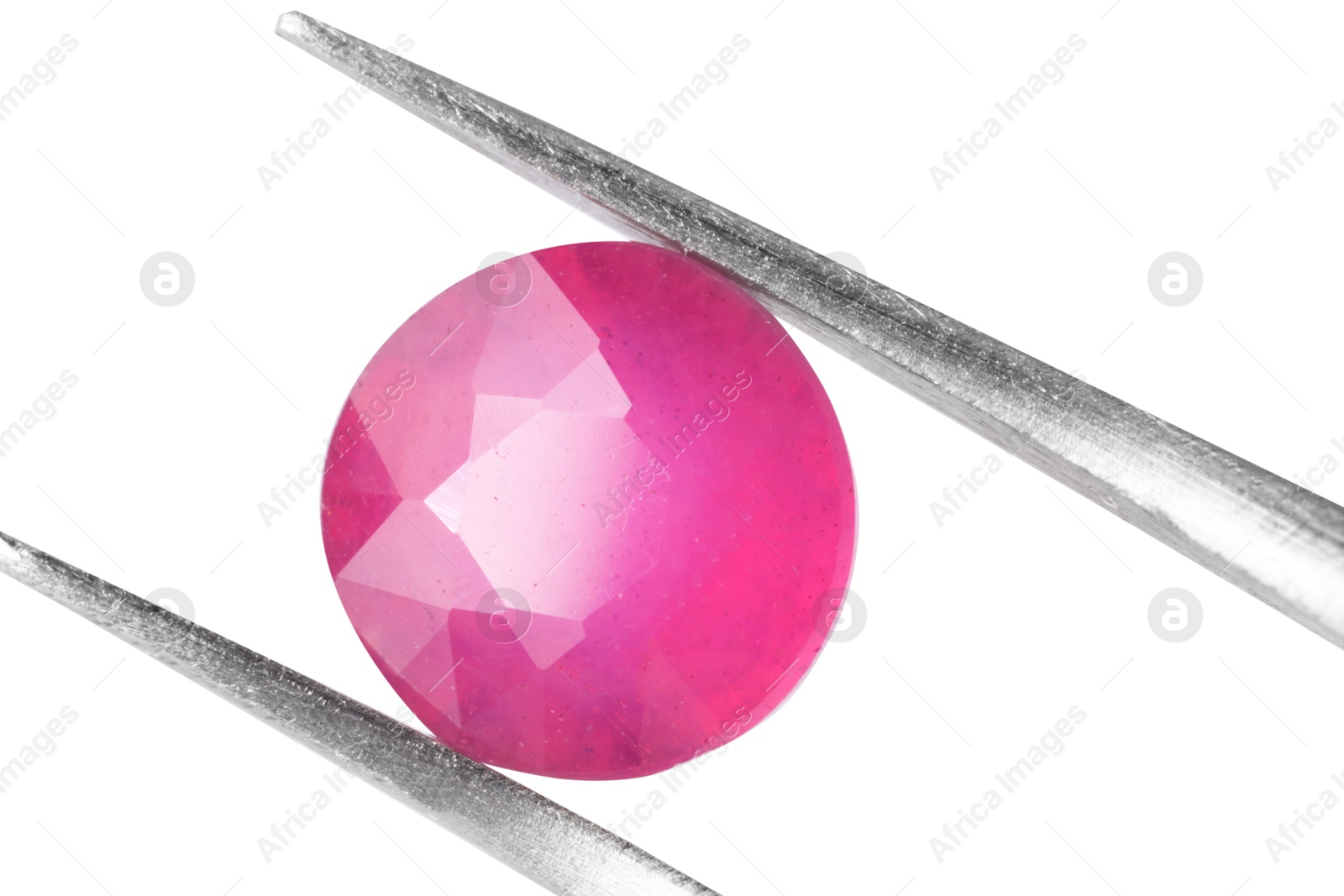 Photo of Tweezers with shiny pink gemstone isolated on white