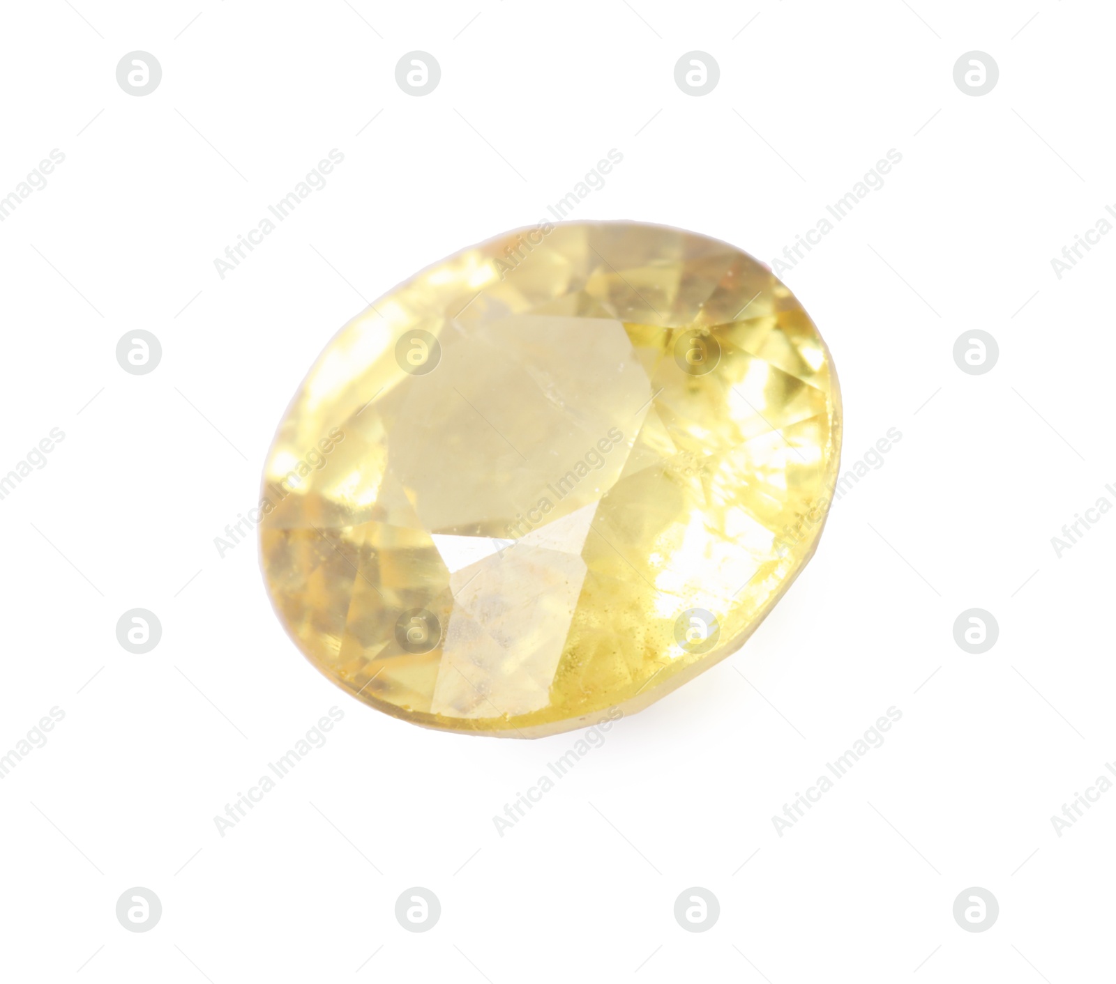 Photo of One shiny yellow gemstone isolated on white