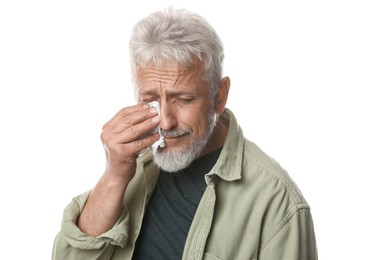 Photo of Sad senior man crying on white background