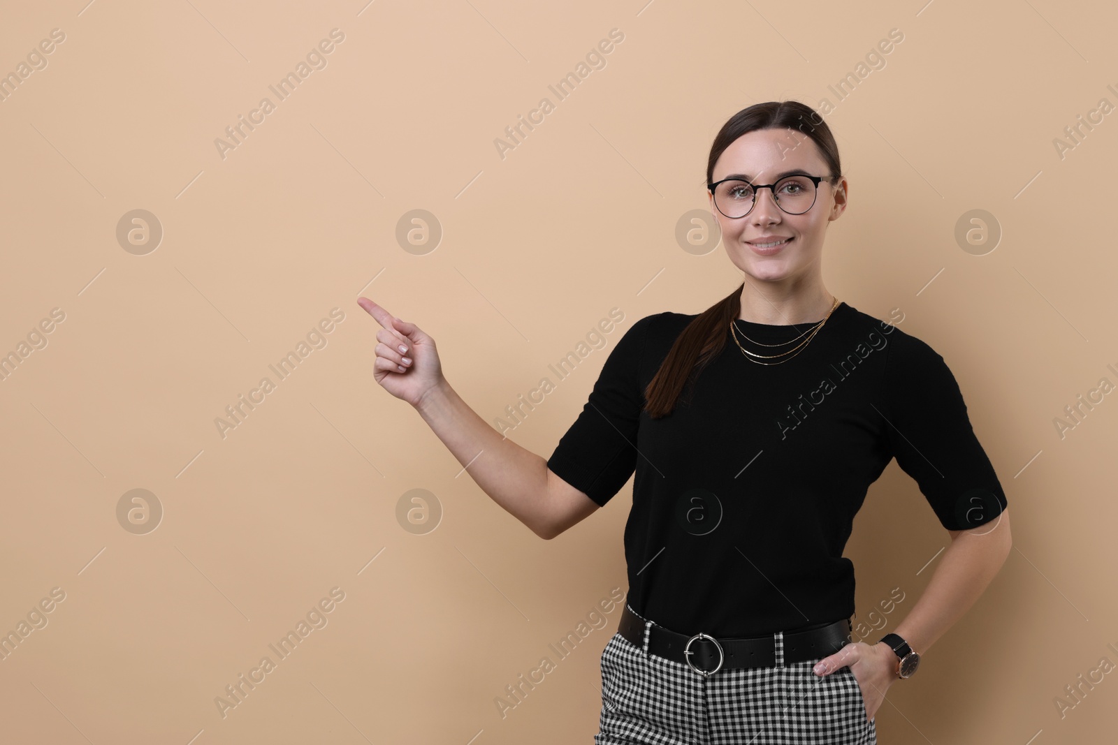 Photo of Portrait of businesswoman on beige background, space for text