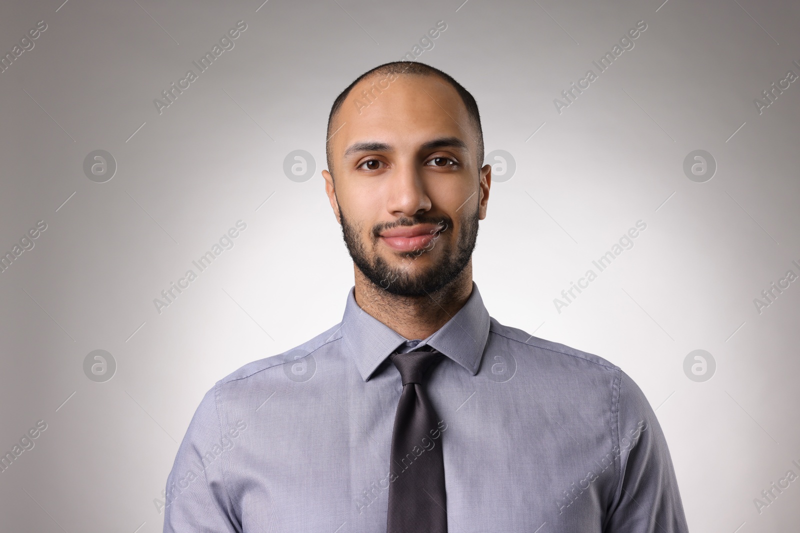 Photo of Portrait of businessman on light gray background