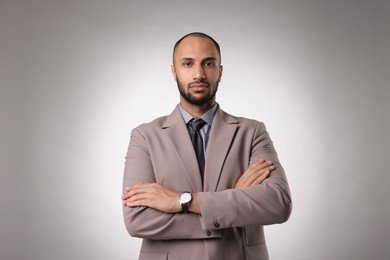 Photo of Portrait of businessman on light gray background