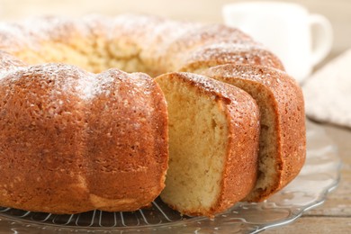 Photo of Freshly baked sponge cake on table, closeup