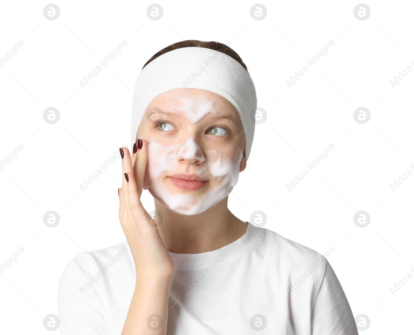 Photo of Teenage girl washing her face with cleanser on white background. Cosmetic product