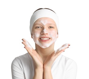 Photo of Teenage girl washing her face with cleanser on white background. Cosmetic product